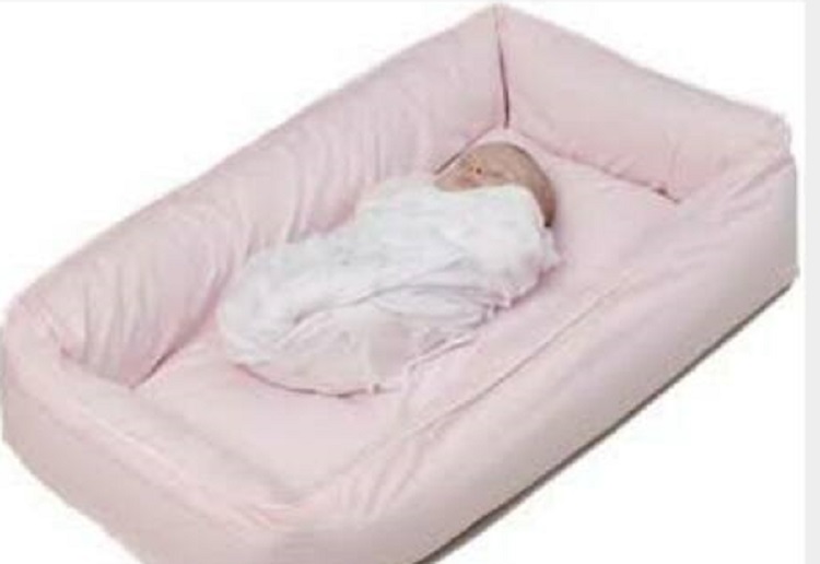 Mum issues warning after death of her infant in baby cot insert