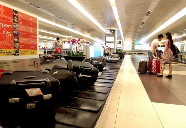 Toddler's Wild Luggage Belt Ride Goes Viral Mouths of Mums